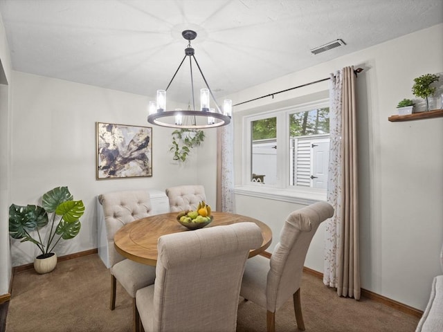 49 Meadow Pond Dr Unit I, Leominster, MA 01453 - carpeted dining area with baseboards and a chandelier