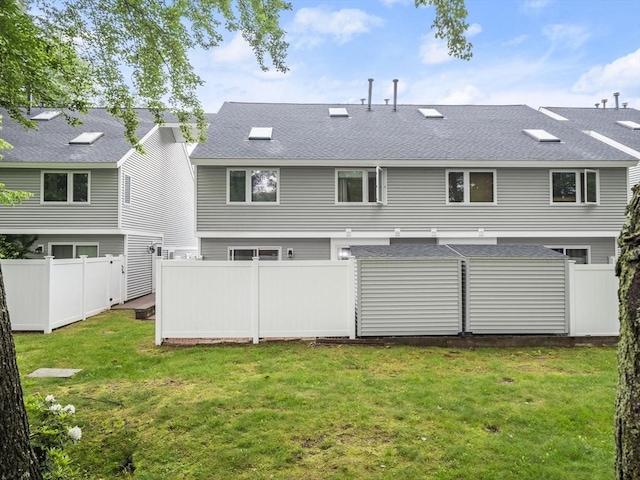 49 Meadow Pond Dr Unit I, Leominster, MA 01453 - rear view of property featuring a shingled roof