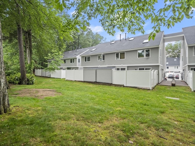 49 Meadow Pond Dr Unit I, Leominster, MA 01453 - rear view of house with a wooden deck