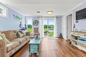 living area featuring wood finished floors