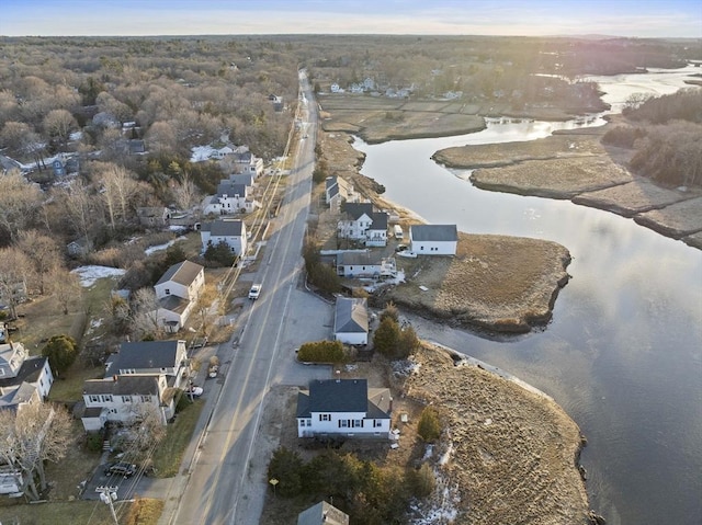 bird's eye view featuring a residential view and a water view