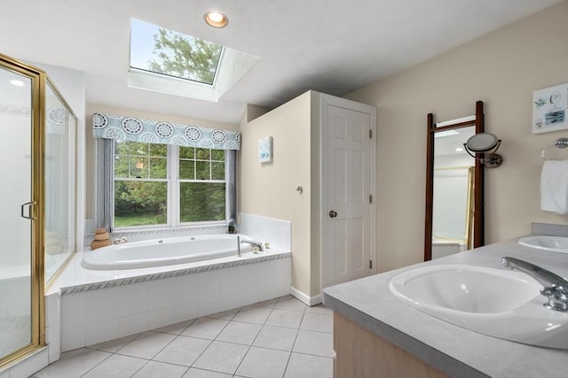 27 Bowker Dr, Sudbury, MA 01776 - full bathroom with a skylight, a bath, a shower stall, tile patterned floors, and double vanity