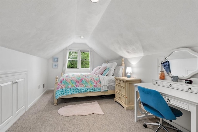 27 Bowker Dr, Sudbury, MA 01776 - bedroom with vaulted ceiling, light carpet, a desk, and baseboards