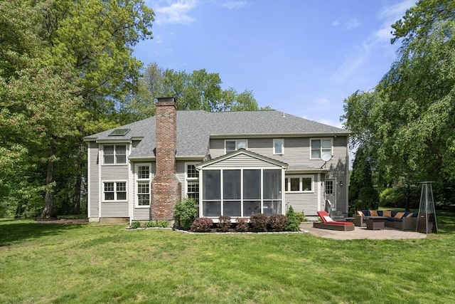 27 Bowker Dr, Sudbury, MA 01776 - back of house with outdoor lounge area, a patio area, a yard, a chimney, and a sunroom