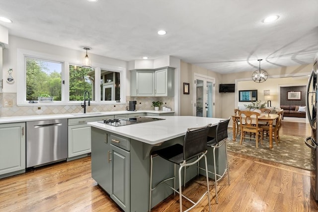 27 Bowker Dr, Sudbury, MA 01776 - kitchen featuring dishwasher, gray cabinets, black electric cooktop, a sink, and recessed lighting