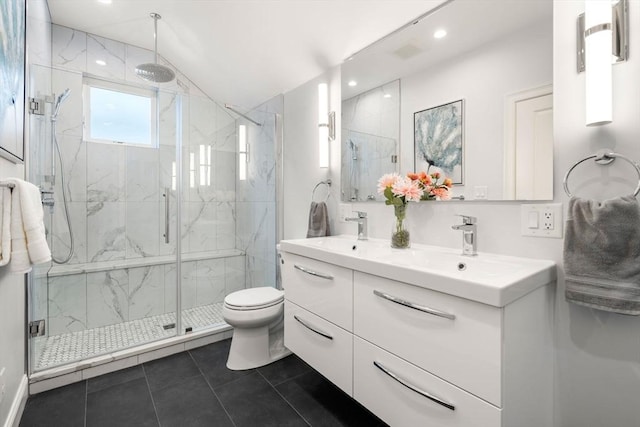 bathroom featuring tile patterned floors, walk in shower, vanity, and toilet