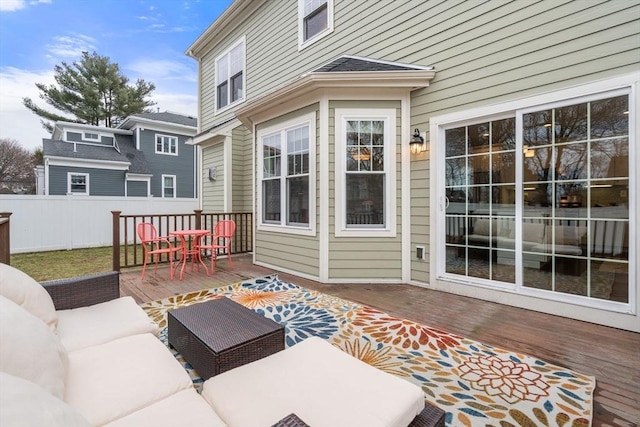 deck featuring an outdoor living space