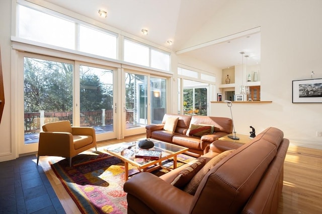 sunroom featuring lofted ceiling