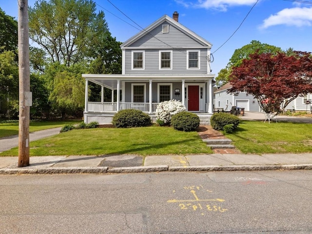 14 Parkman St, Westborough, MA 01581 - view of front of house with a chimney, covered porch, and a front yard