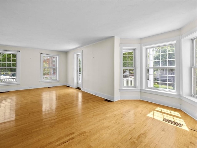 14 Parkman St, Westborough, MA 01581 - unfurnished living room with baseboards and wood finished floors