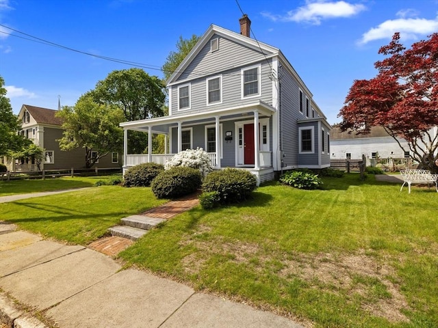 14 Parkman St, Westborough, MA 01581 - view of front of house with a chimney and covered porch