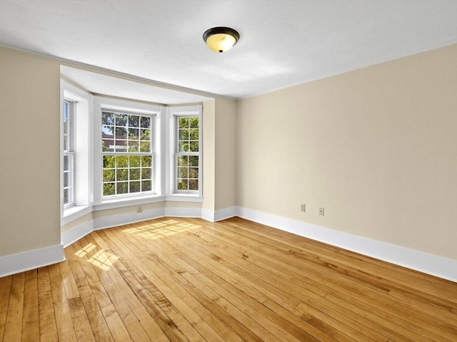 14 Parkman St, Westborough, MA 01581 - spare room featuring baseboards and light wood-style floors