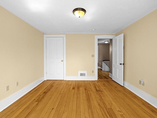 14 Parkman St, Westborough, MA 01581 - unfurnished bedroom with baseboards and light wood-type flooring