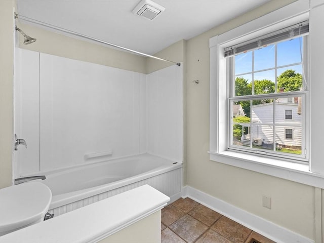 14 Parkman St, Westborough, MA 01581 - full bathroom with baseboards,  shower combination, and toilet