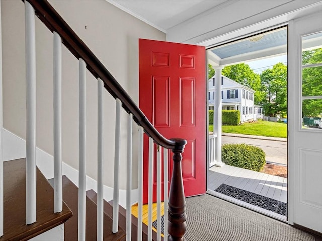 14 Parkman St, Westborough, MA 01581 - foyer entrance featuring stairway, ornamental molding, and carpet flooring