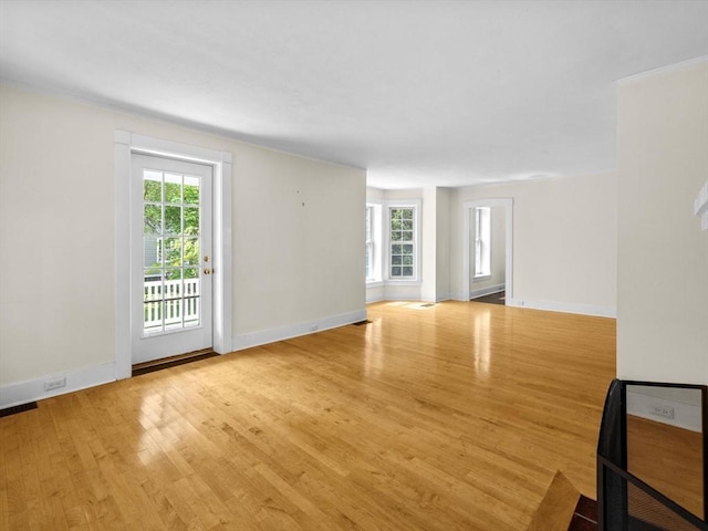 14 Parkman St, Westborough, MA 01581 - unfurnished living room featuring wood finished floors and baseboards