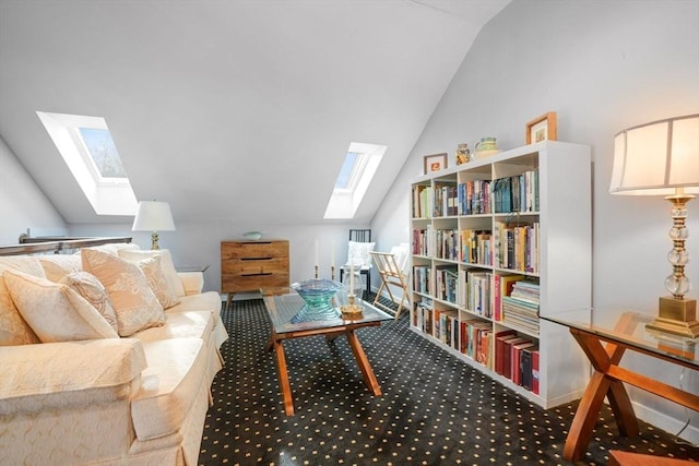 sitting room with carpet flooring and vaulted ceiling with skylight