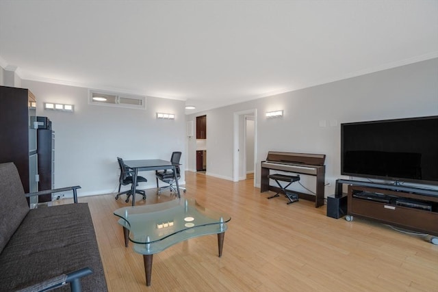 living room with light hardwood / wood-style floors