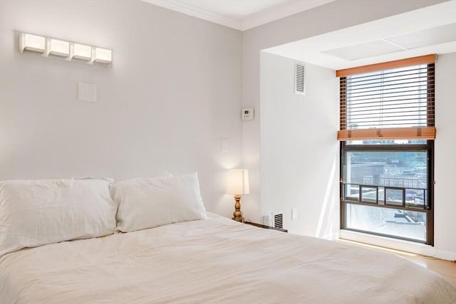 unfurnished bedroom featuring crown molding