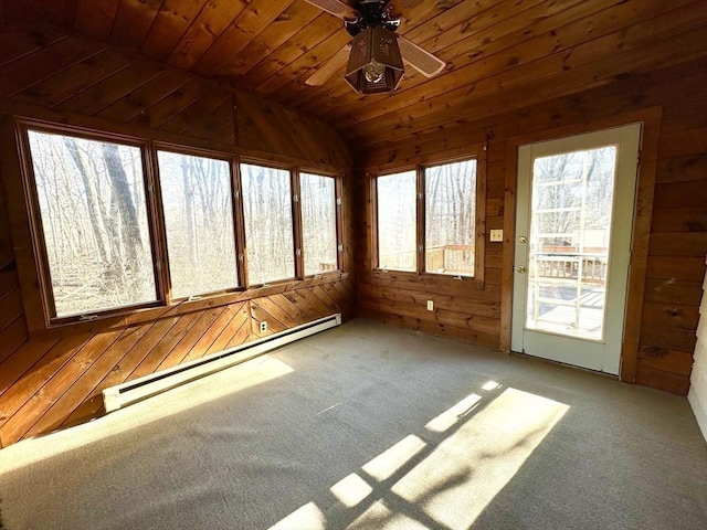 unfurnished sunroom with vaulted ceiling, ceiling fan, wood ceiling, and baseboard heating