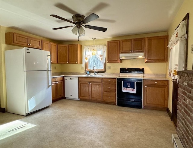 kitchen with sink, baseboard heating, ceiling fan, pendant lighting, and white appliances