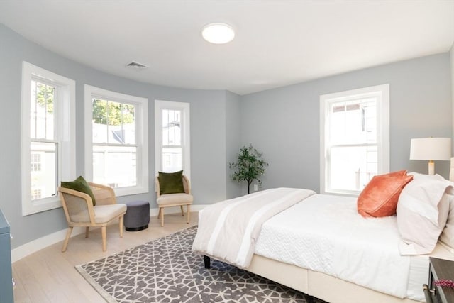 bedroom featuring wood-type flooring