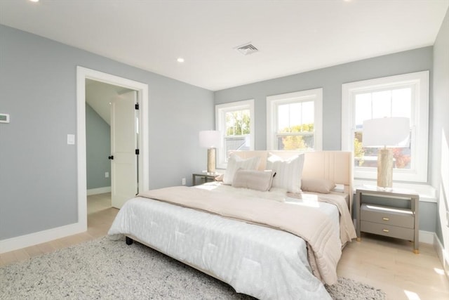 bedroom featuring light hardwood / wood-style flooring