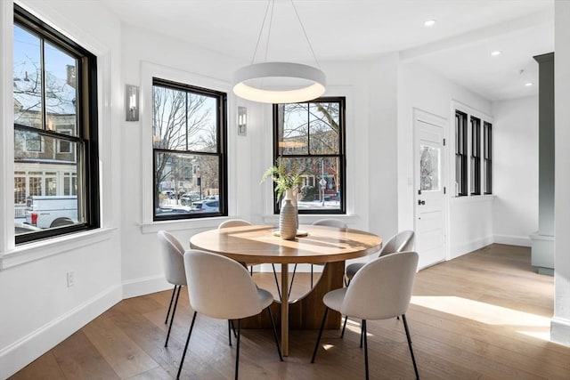 43 Wendell St Unit 0, Cambridge, MA 02138 - dining room featuring plenty of natural light, baseboards, and wood finished floors