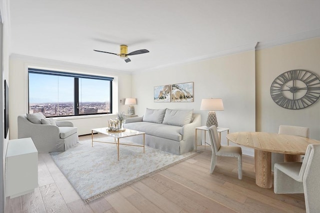 85 E India Row Unit 36D, Boston, MA 02110 - living area featuring light wood-style flooring, ornamental molding, and ceiling fan