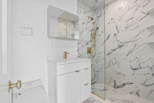 85 E India Row Unit 36D, Boston, MA 02110 - bathroom featuring vanity, a marble finish shower, and marble finish floors