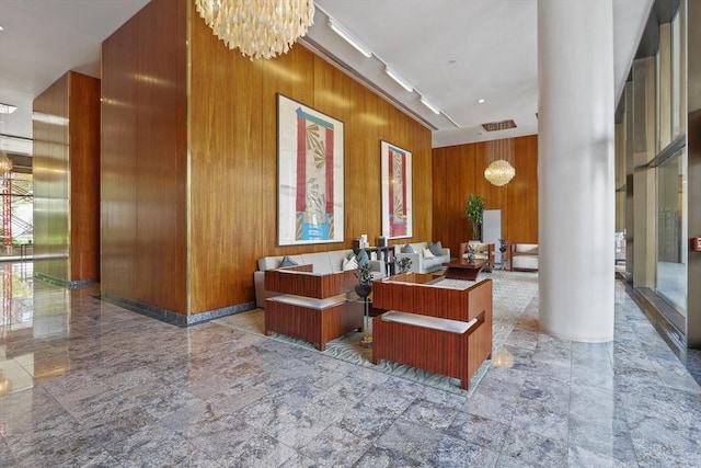 85 E India Row Unit 36D, Boston, MA 02110 - reception area featuring a chandelier and wood walls
