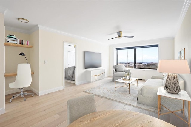 85 E India Row Unit 36D, Boston, MA 02110 - living room featuring crown molding, light wood-style flooring, a ceiling fan, and baseboards
