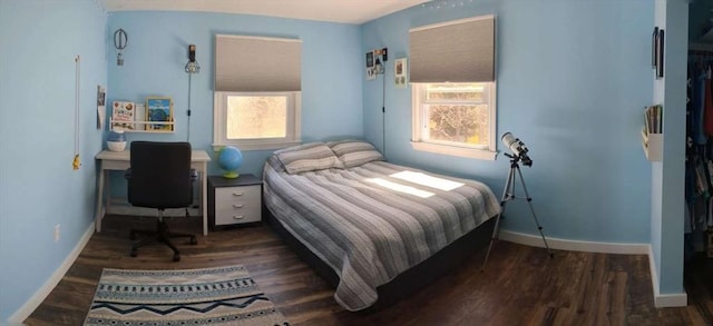 bedroom featuring dark hardwood / wood-style floors