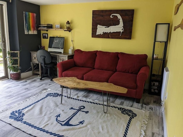 living room with light hardwood / wood-style floors