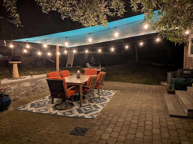 patio at twilight with area for grilling