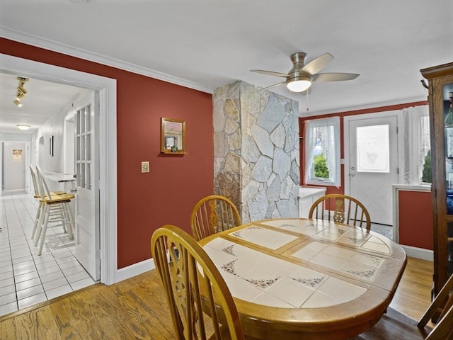 11 View St, Dracut, MA 01826 - dining room featuring ceiling fan, baseboards, ornamental molding, and wood finished floors