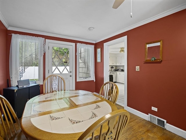 11 View St, Dracut, MA 01826 - dining area with ceiling fan, baseboards, ornamental molding, and wood finished floors