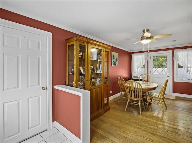 11 View St, Dracut, MA 01826 - dining space with baseboards, ceiling fan, crown molding, and light wood finished floors