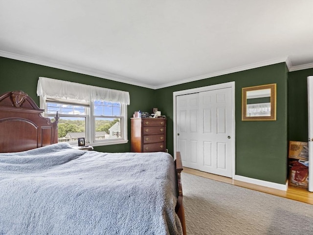 11 View St, Dracut, MA 01826 - bedroom with crown molding, wood finished floors, a closet, and baseboards