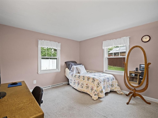 11 View St, Dracut, MA 01826 - carpeted bedroom with a baseboard heating unit, baseboards, and a desk