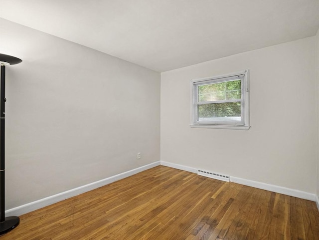 11 View St, Dracut, MA 01826 - unfurnished room with baseboards and wood finished floors