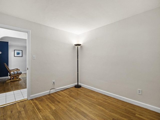 11 View St, Dracut, MA 01826 - spare room with wood finished floors and baseboards