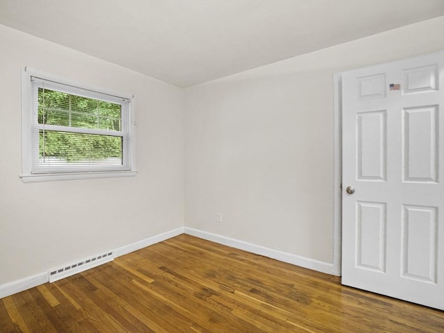 11 View St, Dracut, MA 01826 - spare room featuring baseboards and wood finished floors