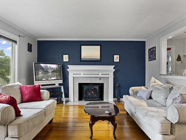 11 View St, Dracut, MA 01826 - living area featuring wood finished floors, ornamental molding, and a tiled fireplace