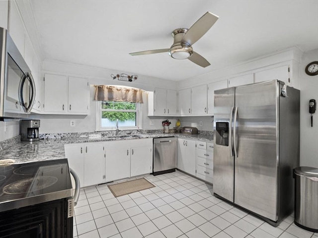 11 View St, Dracut, MA 01826 - kitchen featuring stainless steel appliances, a sink, a ceiling fan, white cabinetry, and crown molding