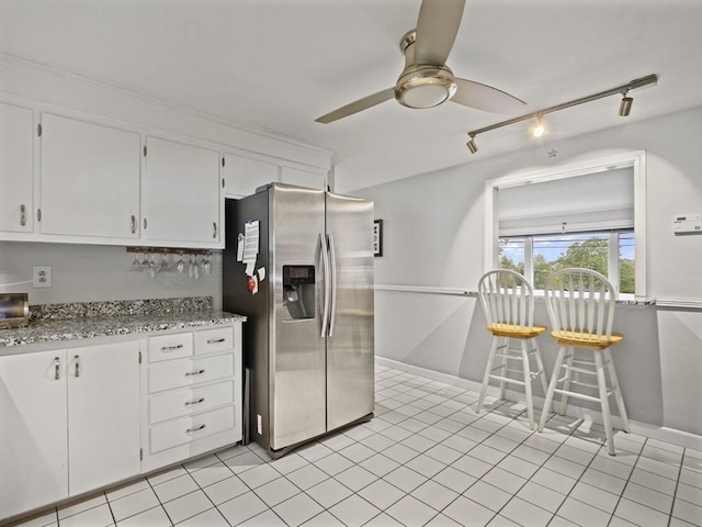11 View St, Dracut, MA 01826 - kitchen featuring stainless steel fridge with ice dispenser, track lighting, white cabinets, and a ceiling fan
