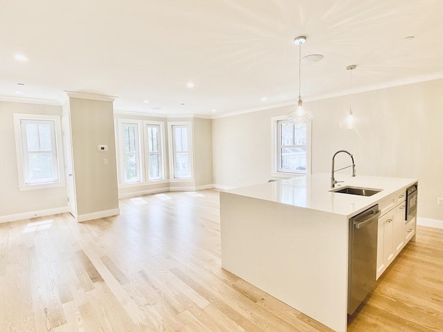 15 Yuill Cir Unit 3, Boston, MA 02136 - kitchen with a sink, dishwasher, ornamental molding, plenty of natural light, and a kitchen island with sink