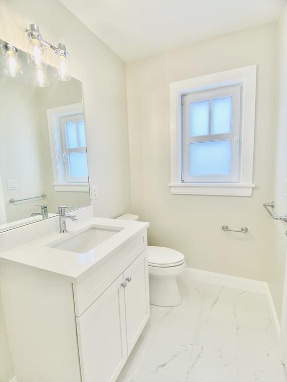 15 Yuill Cir Unit 3, Boston, MA 02136 - bathroom featuring toilet, baseboards, vanity, and marble finish flooring