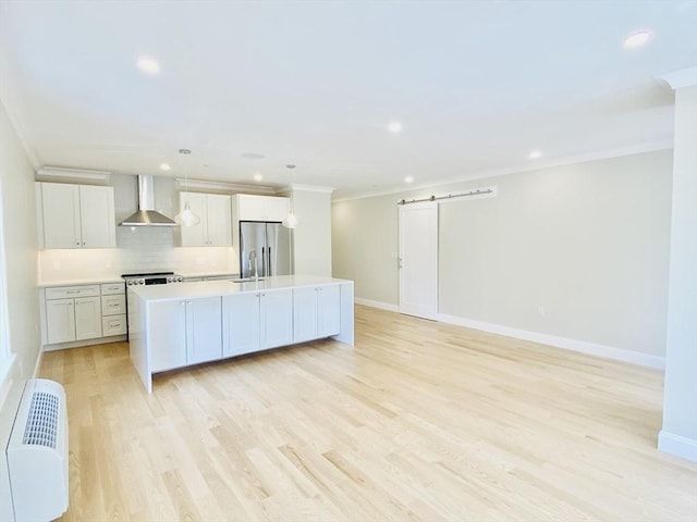 15 Yuill Cir Unit 3, Boston, MA 02136 - kitchen featuring wall chimney exhaust hood, a sink, crown molding, backsplash, and light countertops