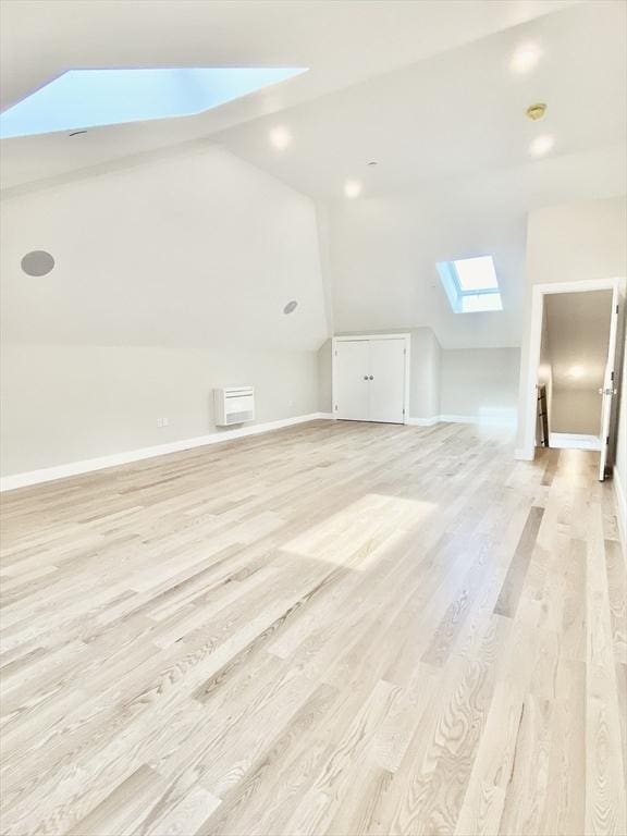 15 Yuill Cir Unit 3, Boston, MA 02136 - additional living space with a skylight, light wood finished floors, vaulted ceiling, and baseboards